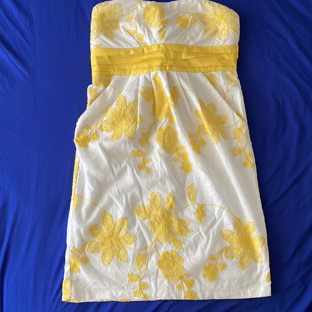 Strapless white dress with yellow embroidery in size 9